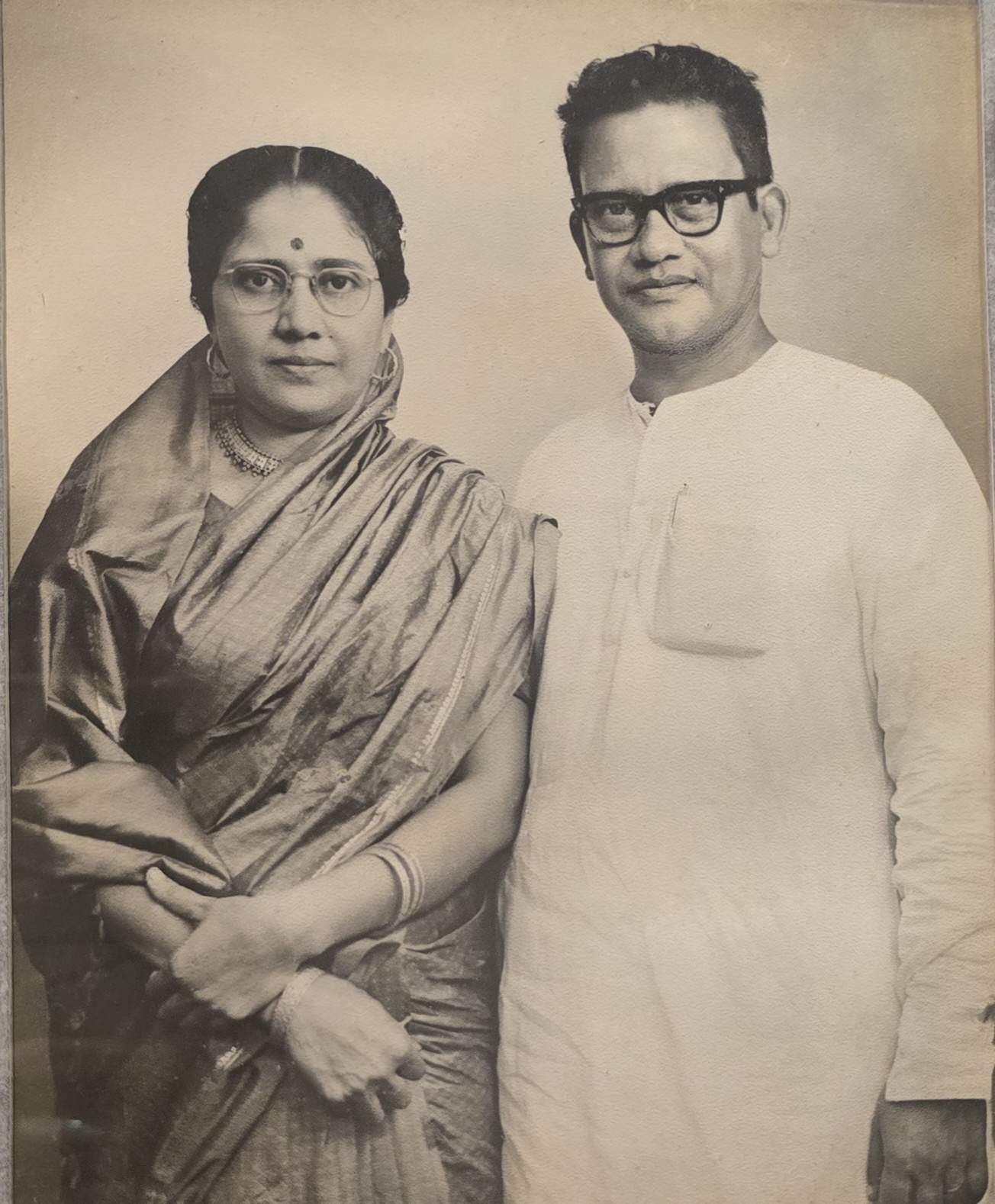 Late Sri Bijoy Ranjan Das and Late Srimati Sovana Das — a formal sepia studio portrait